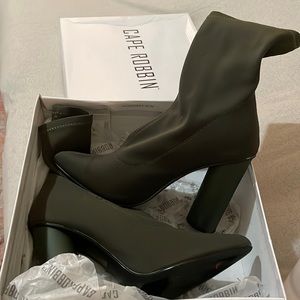 Slightly used green heel boots